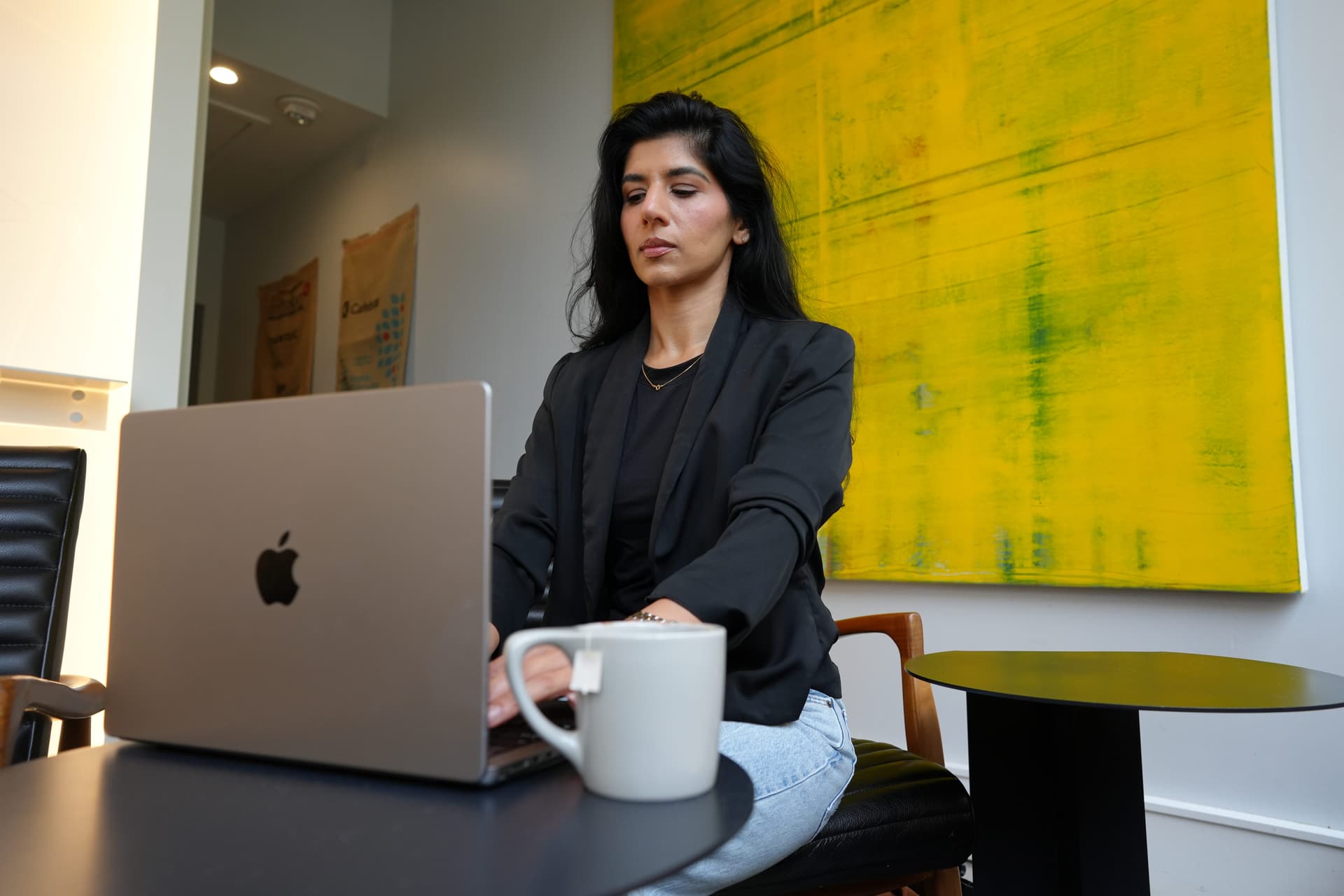 Khalid prefers communicating her value to recruiters over email rather than over the phone.